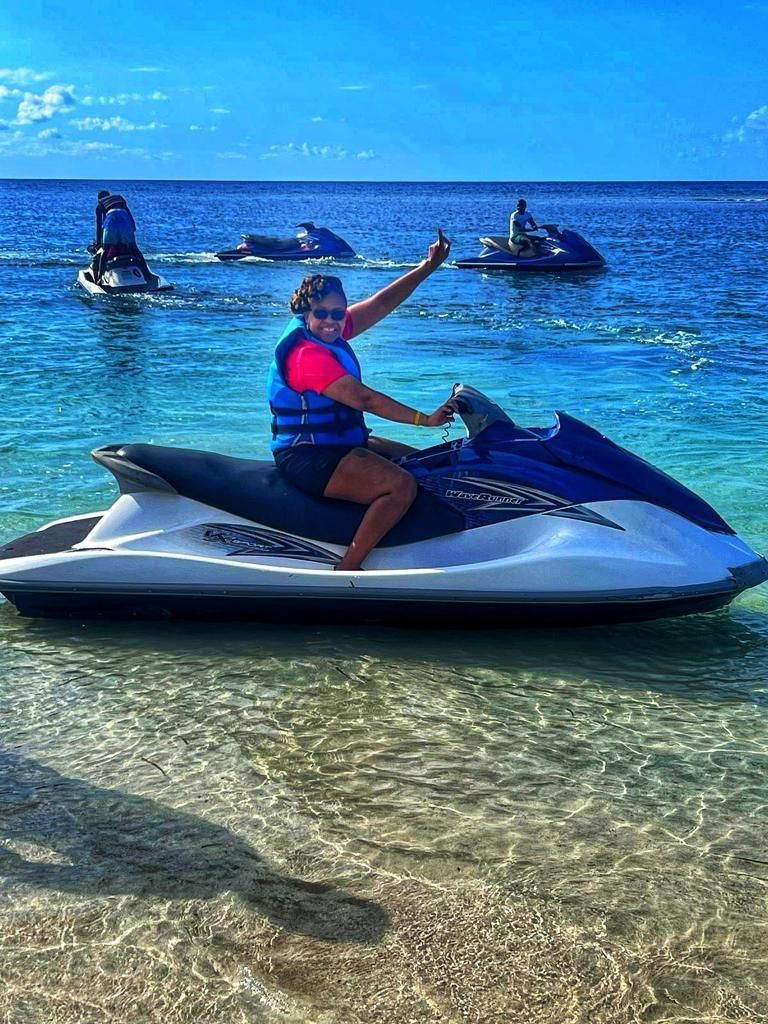 Water sports (jet ski, parasailing, jet car ride, banana boat, sea tubing) with Experience Jamaica Tours