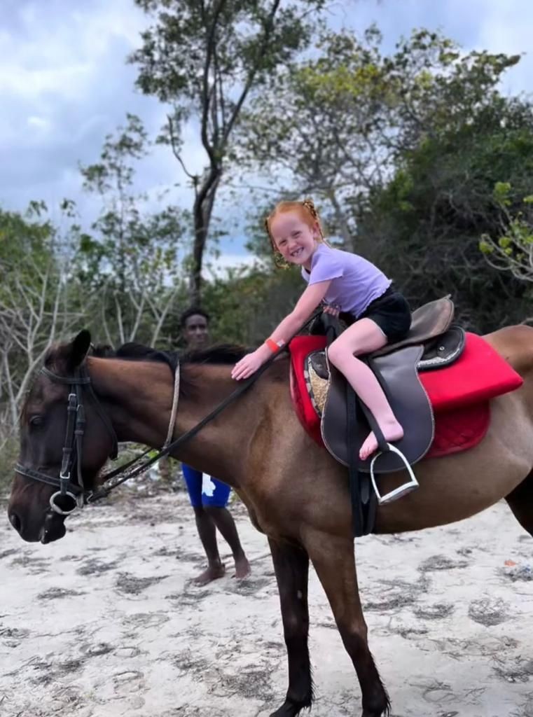 Photo of little girl horseback riding with Experience Jamaica Tours